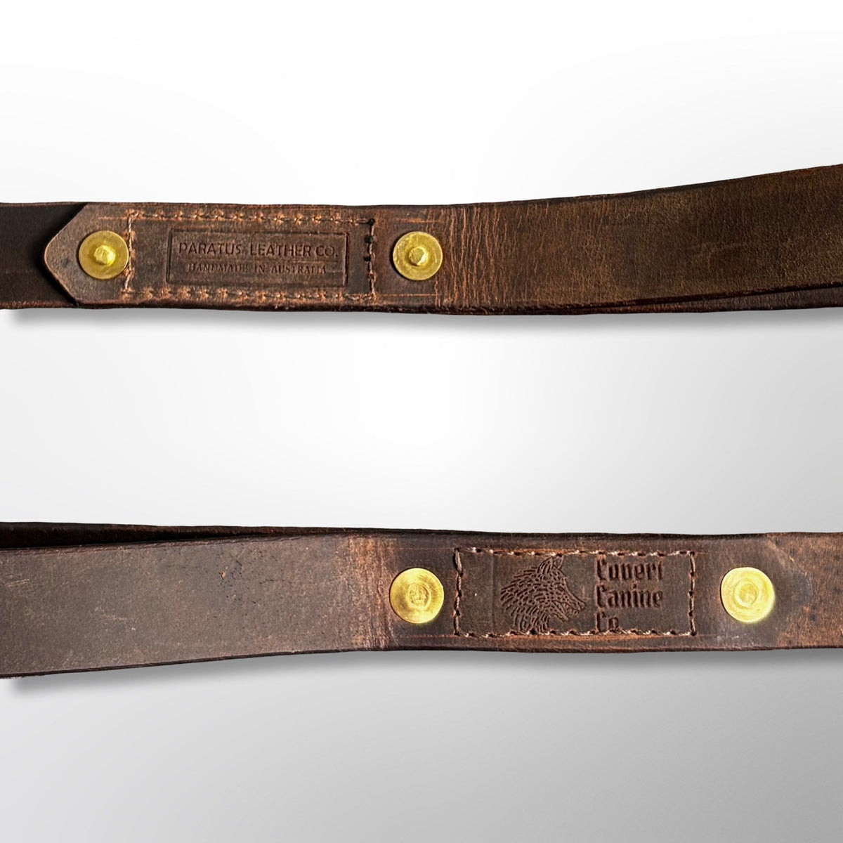 Close-up of the Paratus Leather Co. 'Handmade in Australia' stamp and the Covert Canine Co. logo stamp on the 4ft leather lead