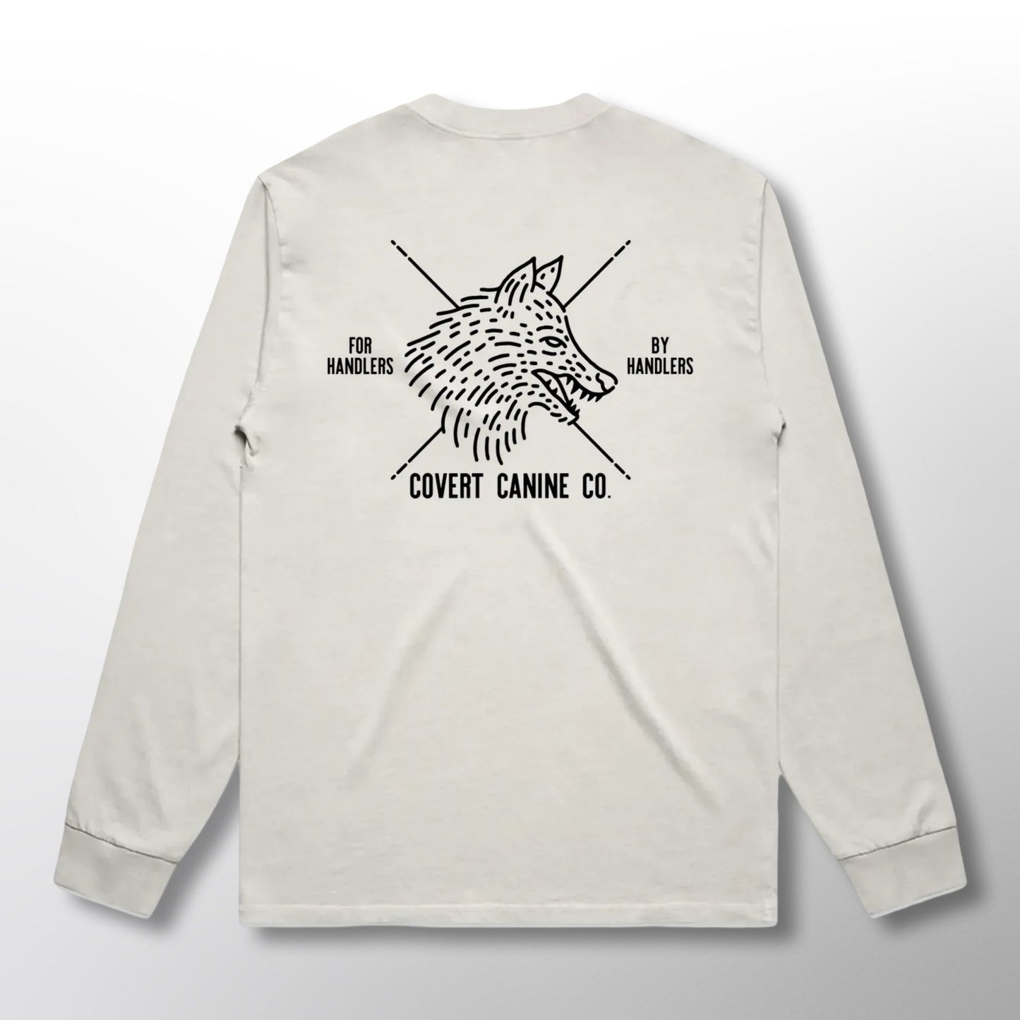 Back of a white long-sleeve shirt with black Covert Canine Co. logo and text on a white background