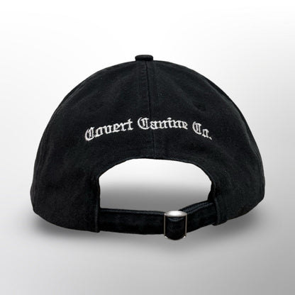 Back of the Covert Canine Co. Signature Cap with embroidered 'Covert Canine Co.' and metal buckle strap